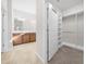 Double vanity bathroom with large closet and natural light at 6119 Sw 93Rd Cir, Ocala, FL 34481