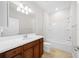 Clean bathroom with a tub, toilet and vanity at 6119 Sw 93Rd Cir, Ocala, FL 34481
