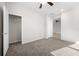 Cozy bedroom with carpet flooring and a walk-in closet at 6119 Sw 93Rd Cir, Ocala, FL 34481