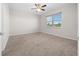 Bright bedroom featuring neutral wall and carpet at 6119 Sw 93Rd Cir, Ocala, FL 34481