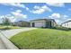 Single-story house with a garage and well-manicured lawn at 6119 Sw 93Rd Cir, Ocala, FL 34481