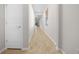 Long hallway with tile flooring and neutral-toned walls at 6119 Sw 93Rd Cir, Ocala, FL 34481