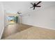 Living room with sliding glass doors to patio and hardwood floor at 6119 Sw 93Rd Cir, Ocala, FL 34481