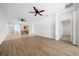 Open living room with hardwood floors and access to kitchen at 6119 Sw 93Rd Cir, Ocala, FL 34481