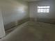 Unfinished bedroom with new flooring at 1100 E Caroline St # 216, Tavares, FL 32778