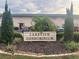 Lakeview Condominium building with landscaping and parking at 1100 E Caroline St # 216, Tavares, FL 32778