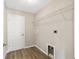Bright laundry room with built-in shelving and plenty of space at 28 Juniper Pass Dr, Ocala, FL 34480