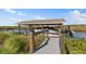 Private boat dock with covered area at 455 Blue Cypress Dr, Groveland, FL 34736