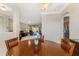 Dining room with round table and chairs, view into living room at 8347 Sw 84Th Place Rd, Ocala, FL 34481