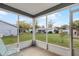 Relaxing screened porch overlooking the backyard at 10930 Sw 83Rd Ct, Ocala, FL 34481