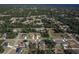 Aerial view of a residential neighborhood with houses and surrounding landscape at 17023 Sw 41St Avenue Rd, Ocala, FL 34473