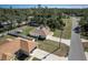 Aerial view of a house with a fenced backyard and neighborhood at 17023 Sw 41St Avenue Rd, Ocala, FL 34473
