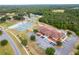 Aerial view of community amenities including tennis courts, basketball courts, and clubhouse at 17023 Sw 41St Avenue Rd, Ocala, FL 34473