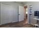 Spacious bedroom with double doors and an adjoining home office at 17023 Sw 41St Avenue Rd, Ocala, FL 34473