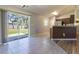 Bright dining area with sliding glass doors leading to the backyard at 17023 Sw 41St Avenue Rd, Ocala, FL 34473