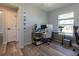 Bright home office with a workspace and built-in shelving at 17023 Sw 41St Avenue Rd, Ocala, FL 34473
