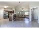 Open kitchen with stainless steel appliances and a breakfast bar at 17023 Sw 41St Avenue Rd, Ocala, FL 34473