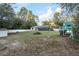 Spacious backyard with playset and shed, near wooded area at 20390 Sw 57Th St, Dunnellon, FL 34431
