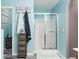 Bathroom with shower, linen storage, and a modern design at 20390 Sw 57Th St, Dunnellon, FL 34431