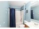 Clean bathroom with a tub shower combination and wood vanity at 20390 Sw 57Th St, Dunnellon, FL 34431