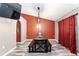 Bright dining room with a rustic farmhouse table and bench seating at 20390 Sw 57Th St, Dunnellon, FL 34431