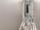 Hallway with wood-like flooring and access to bathroom and bedrooms at 20390 Sw 57Th St, Dunnellon, FL 34431