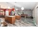 Open kitchen with an island and plenty of counter space at 20390 Sw 57Th St, Dunnellon, FL 34431