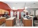 Spacious kitchen featuring double sinks and stainless steel appliances at 20390 Sw 57Th St, Dunnellon, FL 34431