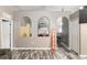 Gathering-friendly living area with built-in shelving and neutral decor at 20390 Sw 57Th St, Dunnellon, FL 34431
