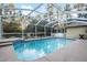 Enjoy this refreshing screened pool and patio at 20390 Sw 57Th St, Dunnellon, FL 34431