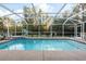 Inviting screened pool with ample backyard space at 20390 Sw 57Th St, Dunnellon, FL 34431