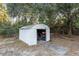 White metal storage shed with double doors at 20390 Sw 57Th St, Dunnellon, FL 34431