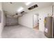 Spacious garage with overhead door and extra storage space at 21150 Sw Marine Blvd, Dunnellon, FL 34431