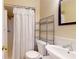Clean bathroom with shower, toilet and sink at 21174 Sw Peach Blossom St, Dunnellon, FL 34431