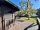 Wooden deck overlooking backyard and grassy area at 45202 Nfs Rd 572-B, Altoona, FL 32702