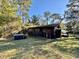 Cabin exterior surrounded by lush greenery at 45202 Nfs Rd 572-B, Altoona, FL 32702