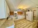 White kitchen cabinets, granite counters, and modern appliances at 45202 Nfs Rd 572-B, Altoona, FL 32702