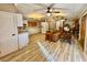 Open concept kitchen features white cabinets and granite countertops at 45202 Nfs Rd 572-B, Altoona, FL 32702