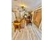 Cozy living room with light brown sofa and wood flooring at 45202 Nfs Rd 572-B, Altoona, FL 32702