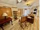 Living area with rocking chair and wooden coffee table at 45202 Nfs Rd 572-B, Altoona, FL 32702