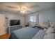 Primary bedroom with a large bed and plenty of light at 6336 Sw 60Th Ave, Ocala, FL 34474