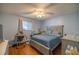 Bright bedroom with a double bed and baby items at 6336 Sw 60Th Ave, Ocala, FL 34474