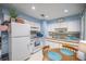 Bright kitchen with white cabinets and a breakfast nook at 6336 Sw 60Th Ave, Ocala, FL 34474