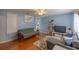 Spacious living room with wood floors and comfy seating at 6336 Sw 60Th Ave, Ocala, FL 34474