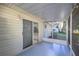 Screened porch overlooking backyard with access to kitchen at 6336 Sw 60Th Ave, Ocala, FL 34474