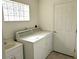 Laundry room with washer, dryer, and a sink at 11547 Sw 70Th Ct, Ocala, FL 34476