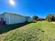 Spacious backyard with grassy area and a view of the neighborhood at 16215 Sw 15Th Ct, Ocala, FL 34473