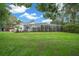 House with screened pool and spacious backyard at 2704 Se 31St St, Ocala, FL 34471