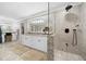 Large bathroom with double vanity and walk-in shower at 2704 Se 31St St, Ocala, FL 34471