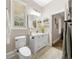 Clean bathroom featuring a white vanity and a toilet at 2704 Se 31St St, Ocala, FL 34471